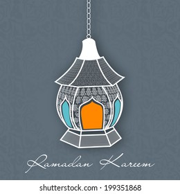 Hanging colorful lanterns on grey background for holy month of Muslim community Ramadan Kareem. 