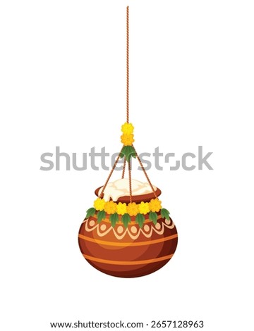 Hanging decorated Dahi Handi clay pot filled with butter, adorned with marigold flowers for Janmashtami festival celebration