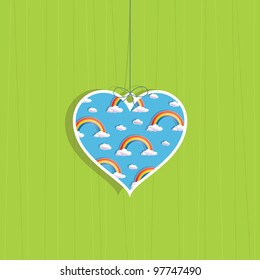 hanging decoration heart of clouds and rainbows on green background, no transparencies