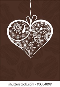 Hanging decorative heart shape in brown color  on heart shape texture background for Valentines Day.