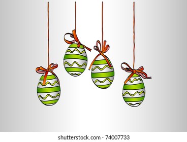 hanging easter eggs on the white