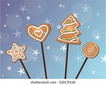 Hanging ginger cookies on a stick in snowfall