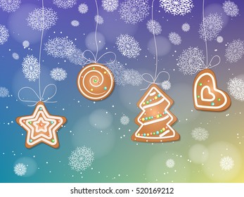 Hanging ginger cookies in snowfall
