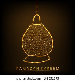 Hanging golden arabic lantern on shiny brown background for holy month of Muslim community Ramadan Kareem. 