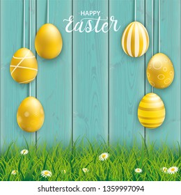 Hanging golden easter eggs on the wooden background. Eps 10 vector file.