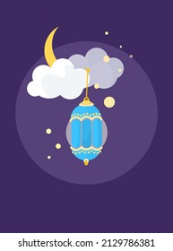 Hanging illuminated lantern from moon in a cloudy sky with the space of calligraphy or writing. Muslim festival ramadan, eid greetings card