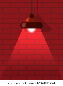 Hanging lamp near bricks wall in red color, illuminated electronic equipment. Lightbulb with tube with shadow, element of interior, chandelier. Vector illustration in flat cartoon style
