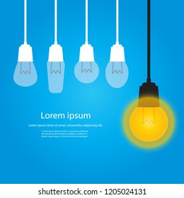 hanging light bulbs with glowing one on a blue background. bright idea and insight concept
