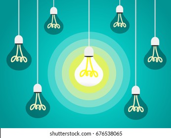 Hanging light bulbs with glowing one isolated on dark background/creative ideas concept