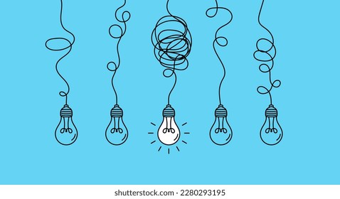 Bombillas colgadas con una resplandeciente sobre el fondo azul. Concepto de idea