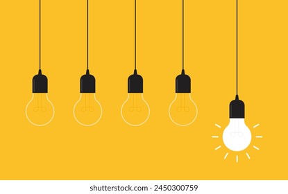 Hanging light bulbs with one glowing on yellow background. Concept of idea