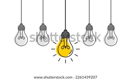 Hanging light bulbs with one glowing on white background. Concept of idea