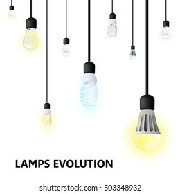Hanging on cords light bulbs on a white background. LED lamp, energy saving compact fluorescent lightbulb, and Incandescent light bulb. lamps evolution