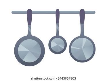 Hanging pans. Kitchen utensils. Set of frying pan of different sizes