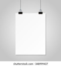 Hanging paper with shadow on a  grey background