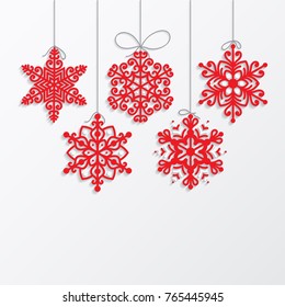 Hanging paper snowflakes vector illustration. Ornate Christmas decorations with shadow. Paper art volumetric design for New Year and xmas 
