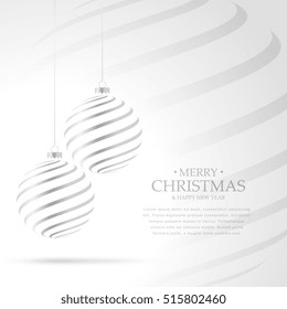 hanging silver christmas balls on white background