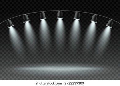 Holofotes de estúdio pendurados iluminando a área de palco