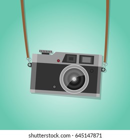 Hanging vintage camera - green background. Vector.