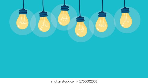 Hanging Yellow Light Bulb Blue Background