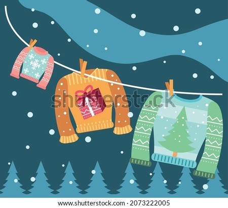 haning ugly sweaters in the landscape