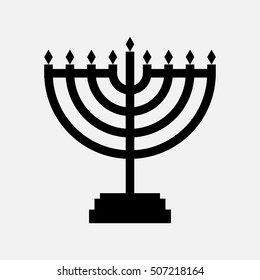 Hanukkah menorah icon with candles black isolated