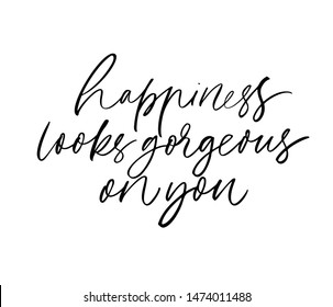 Happiness looks gorgeous on you ink brush vector calligraphy. Romantic phrase handwritten brush lettering. Optimist phrase, wise saying. T shirt decorative print. Positive message, happiness wish. 