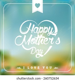 Happpy Mothers Day heart shaped typographical background. Blurred background.