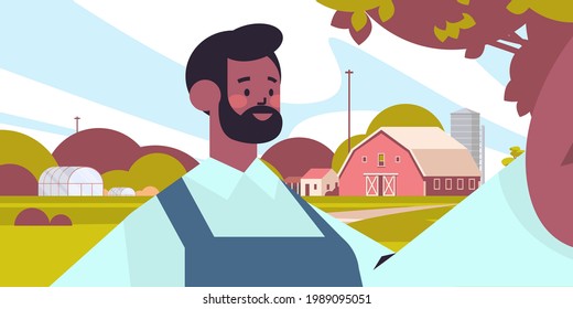 happy african american farmer taking selfie on smartphone camera man making self photo farmland background