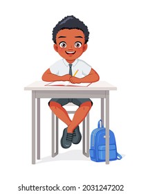 Happy African American school boy sitting at desk studying. Cartoon vector illustration isolated on white background.