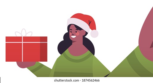 happy african american woman in santa hat with gifts holding camera and taking selfie new year christmas holidays celebration concept horizontal portrait vector illustration