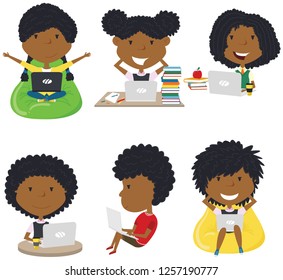 Happy African-American girls with laptops. Students learn and do homework by computer. 