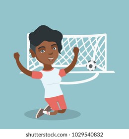 Happy african-american soccer player celebrating a goal. Young football player kneeling with raised arms on the background of football gate with ball in it. Vector cartoon illustration. Square layout.