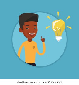 Happy african-american student pointing at the idea bulb. Young excited student with bright idea bulb. Student having a great idea. Vector flat design illustration in the circle isolated on background