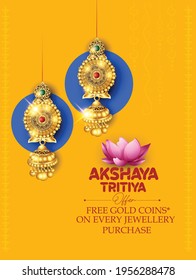 Happy Akshay Tritiya celebration, Pot, gold, coconut and mango leaves, lotus flower, gold jewellery symbol of prosperity 