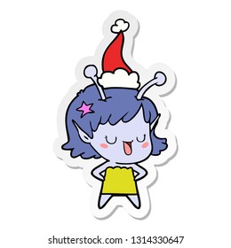 happy alien girl hand drawn sticker cartoon of a wearing santa hat