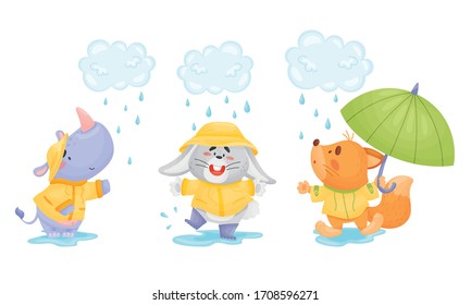 Happy Animals Wearing Raincoat Jumping in Puddles Vector Set