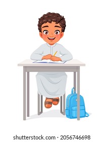 Happy Arab school boy sitting at desk studying. Cartoon vector illustration isolated on white background.