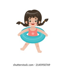 Happy asian baby girl with inflatable ring. Adorable child in swimwear jumping with rubber ring.