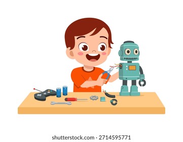 Niño asiático feliz sonriendo mientras monta un robot con alicates y herramientas en una mesa para un proyecto divertido