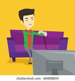 Happy asian gamer sitting on a sofa and playing video game on the television. An excited young man with console in hands playing video game at home. Vector flat design illustration. Square layout.