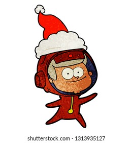 happy astronaut hand drawn textured cartoon of a wearing santa hat