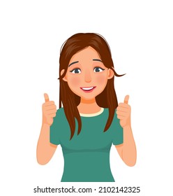 Happy beautiful young woman giving thumb up and positive feedback approval standing looking confident with smiling facial expression.