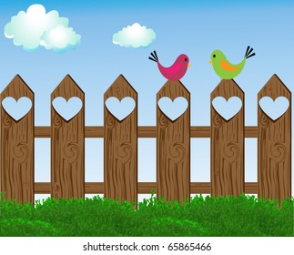 happy birds on wooden fence with hearts