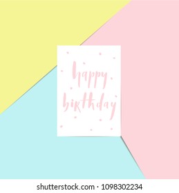 Happy birthday - brush lettering card on a pink, blue and yellow background vector.Typography design. Greetings card.