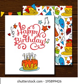 Happy Birthday card background with cakes on wooden table