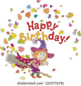 Happy birthday card with a funny little witch flying on her magic broom through falling and swirling colorful autumn leaves, vector cartoon illustration isolated on a white background