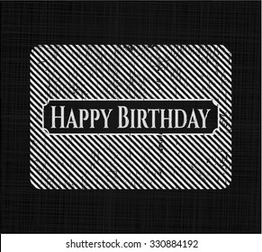 Happy Birthday chalk emblem written on a blackboard