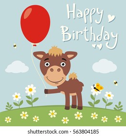 Happy birthday! Funny camel with red balloon on flower meadow in cartoon style.