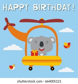 Happy birthday! Funny koala with gift flying on helicopter. Greeting card.